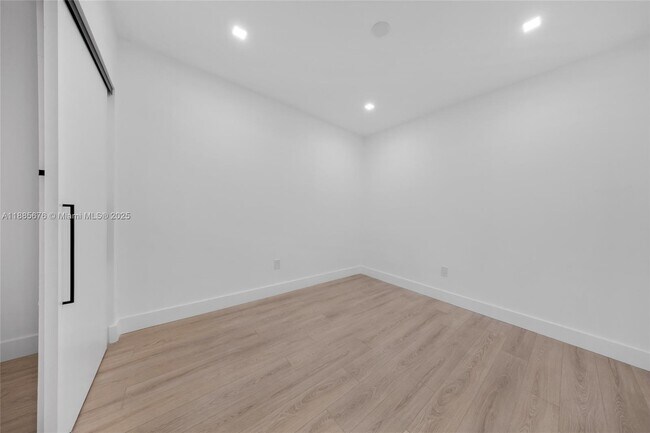 Building Photo - 7901 Hispanola Ave