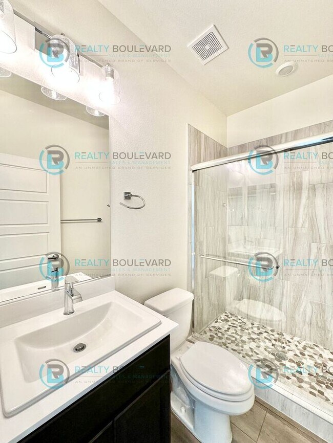 Building Photo - Modern 2 Bedroom 2Bath Townhome with Dual Patios & Designer Finishes near Truckee River