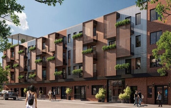 Stylish balconies shaded by corten steel sun screens - Copper Flats