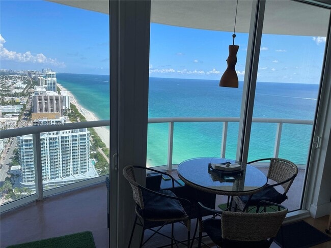 Building Photo - 6365 Collins Ave