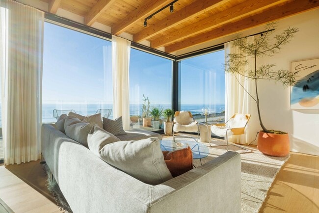 Building Photo - Fully Furnished, Modern Coastal Luxury with Stunning Ocean Views – 4BR/4BA Architectural Gem in C...