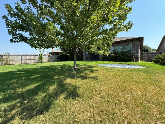 Building Photo - Argyle ISD Gem with Huge Private Backyard & Open Floorplan