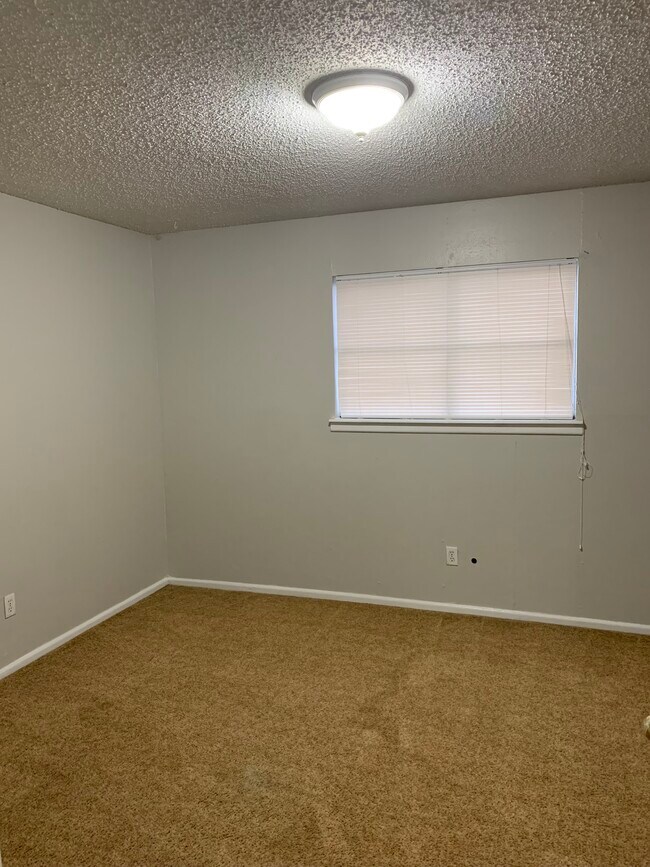 Building Photo - WoodCreek Apartments