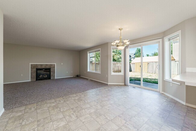 Building Photo - Your Next Home Awaits! 4BR/2.5BA with Fenc...