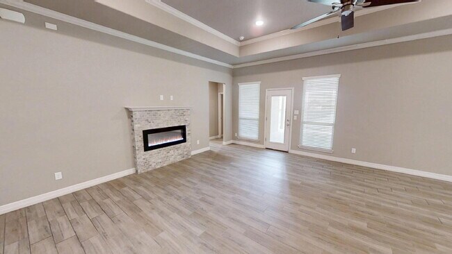 Building Photo - "Charming 4-Bedroom Retreat with Granite Elegance & Cozy Fireplace in Killeen!"