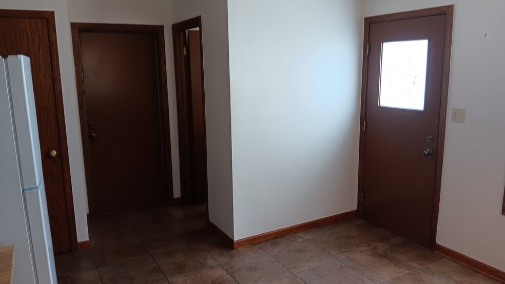 Kitchen Side Door and Door to Garage - 7901 Daniel Ct