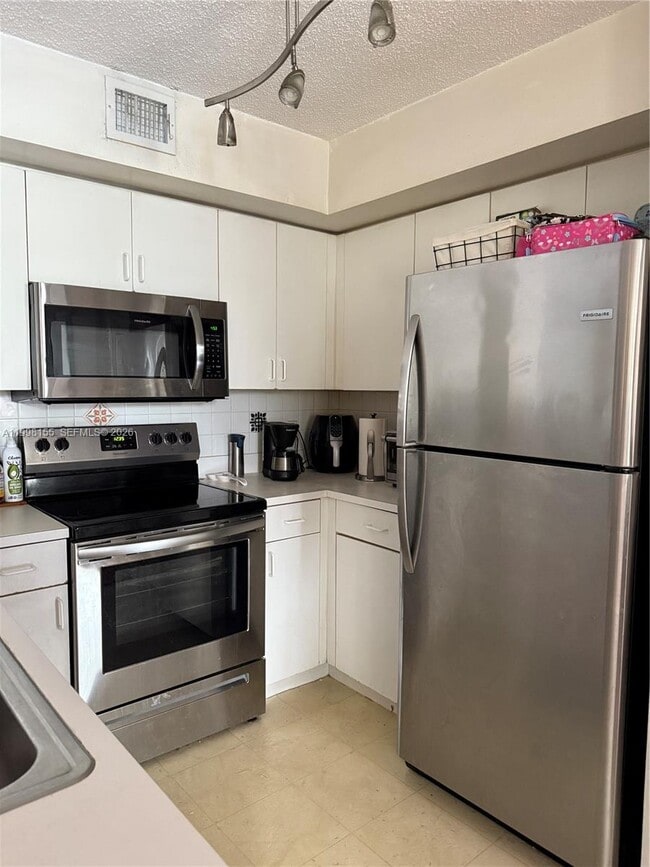 Building Photo - 4560 NW 107th Ave