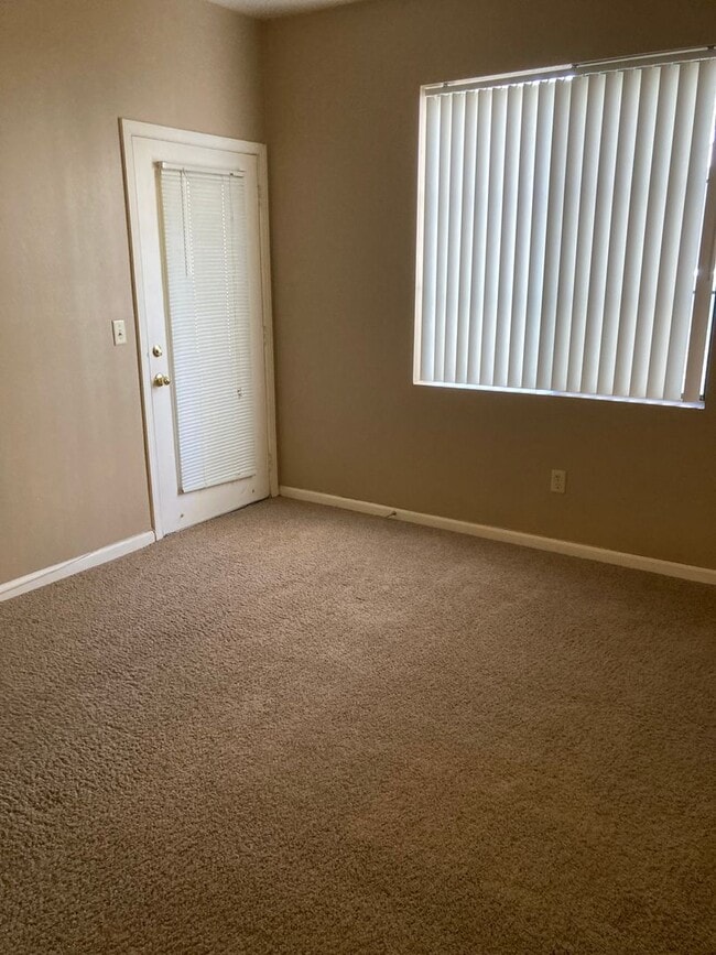 Building Photo - Tanamera Resort Gated Community.  One bedroom, one full bathroom, one car attached garage.