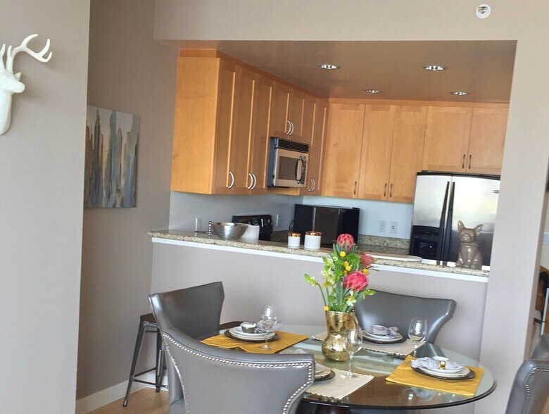 Large Kitchen with wood cabinets and dishwasher - 250 King St