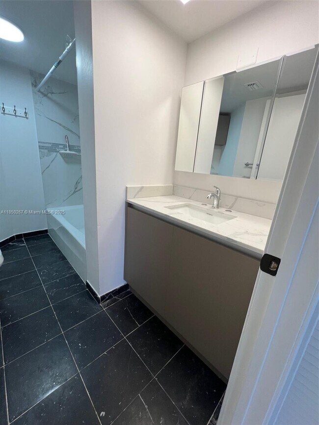 Building Photo - 6767 Collins Ave