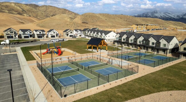 Building Photo - BRAND NEW LUXURY ROW END TOWNHOUSE W 2 CAR GARAGE