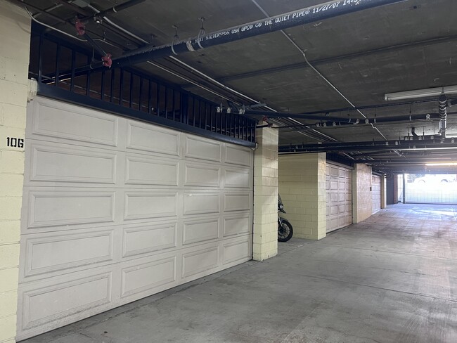 The garage leading to the building outside gate - 430 W Wilson Ave