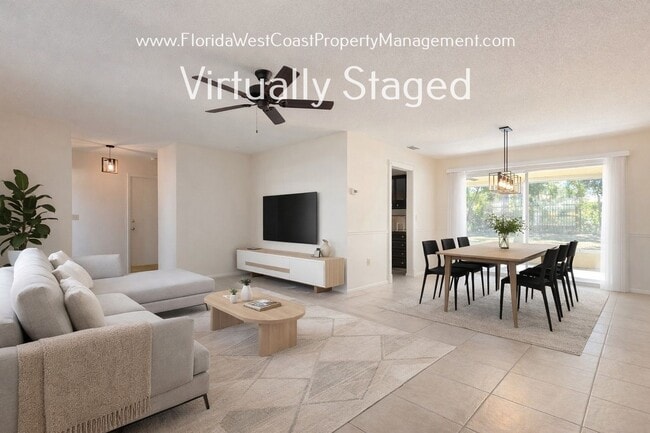 Building Photo - SPACIOUS SARASOTA HOME WITH LARGE FENCED YARD! MOVE IN READY! ALL TILE/ NEW LVP!
