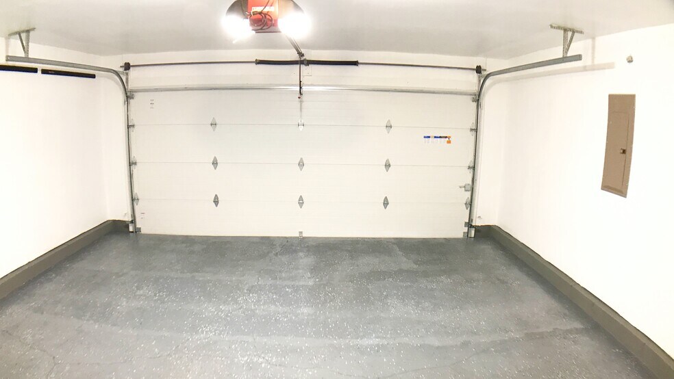 Completely finished, insulated, over-sized 2 car garage with epoxy coated floor - 3027 Abby Way