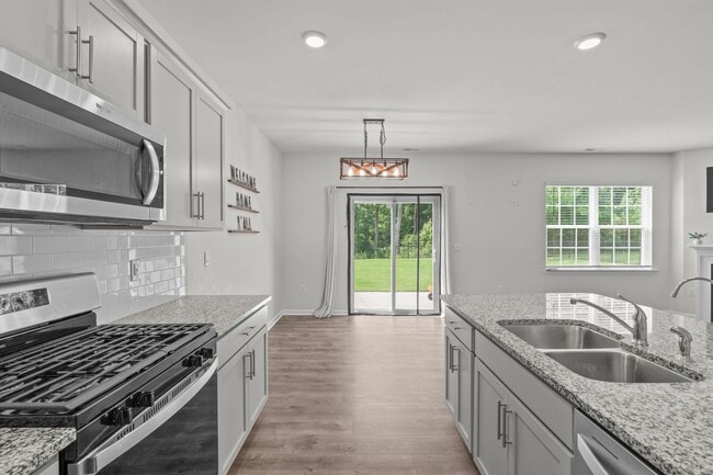 Building Photo - Spacious 5 Bedroom Home with a Fully Fence...