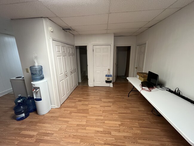 Laundry closet, desk area, bathroom entries - 107 E Culton St