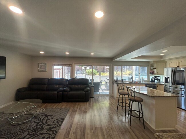 Building Photo - Upgraded 4-Bedroom Home in Gated Green Riv...