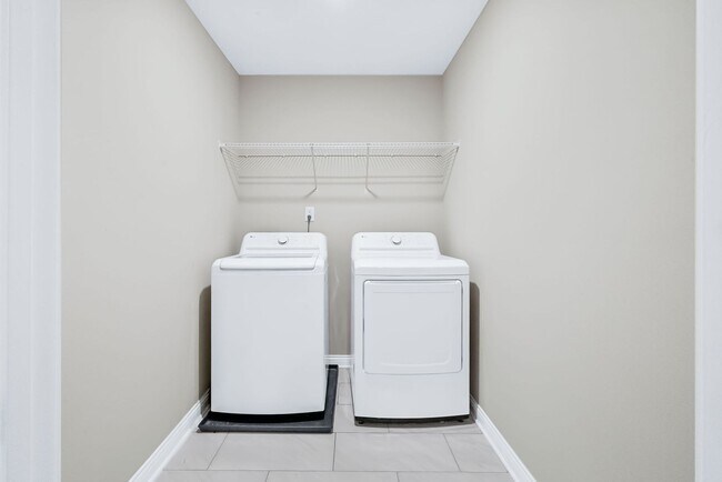 Building Photo - Stocked Pond, Walking Trails and More!!