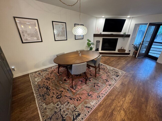 Building Photo - Bright 2BR Townhome with 3 Balconies & Private Patio
