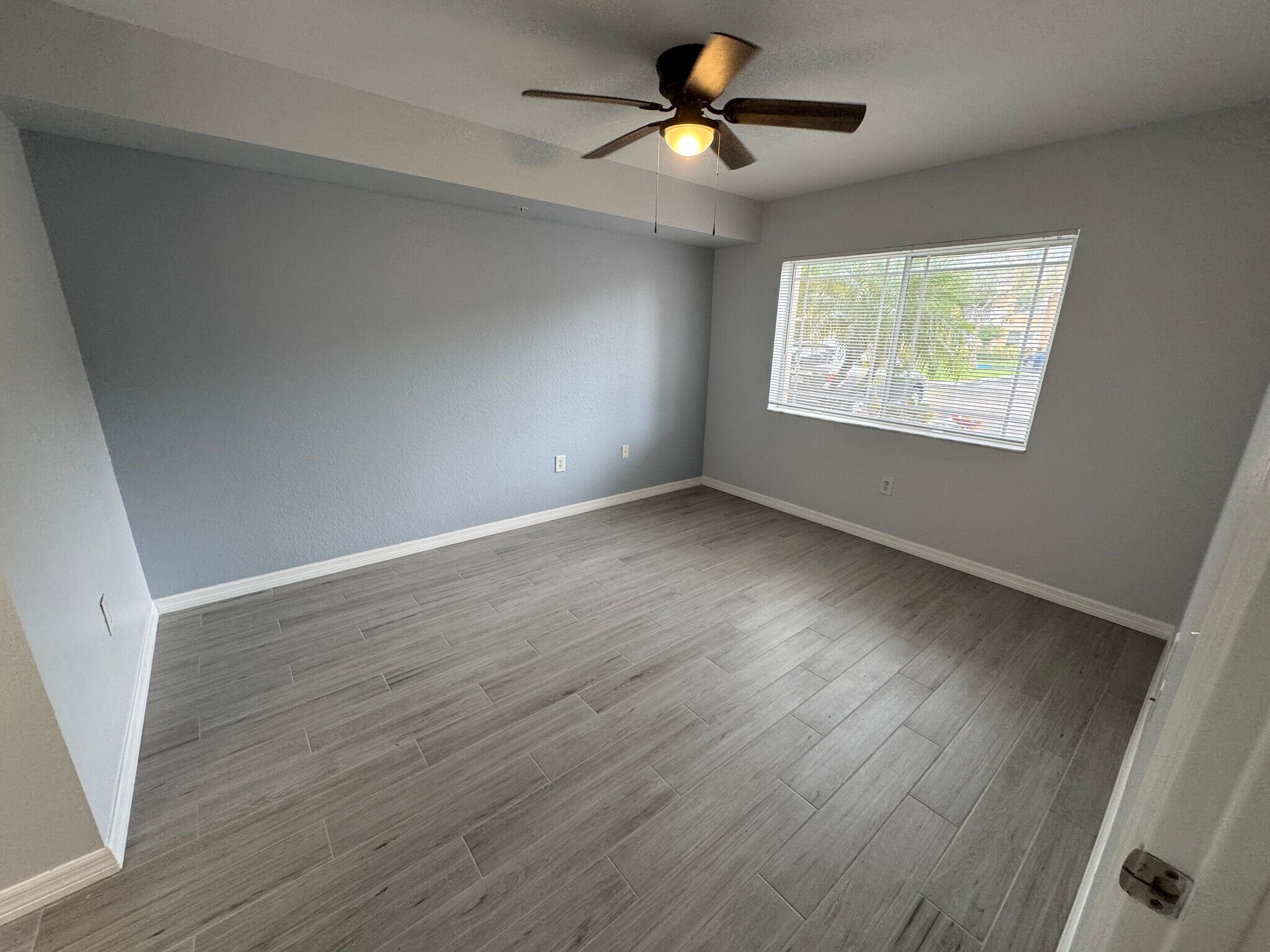 Primary Bedroom - 141 SW Palm Dr