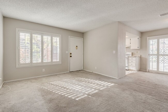 Building Photo - Charming Two-Story Townhome with Private C...