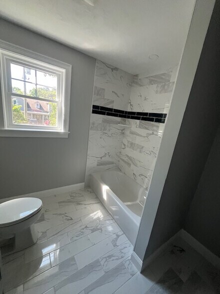 2 Full & 1 Half bathroom - 159 Washington St
