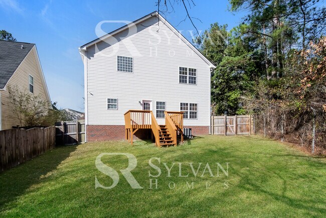 Building Photo - Turn the key. Enter. Smile. Repeat every day!