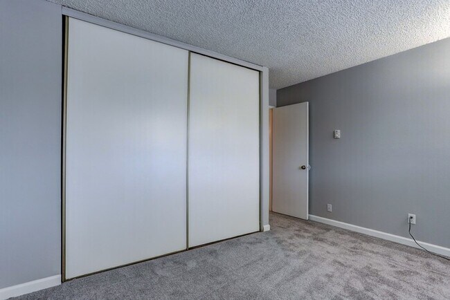 Building Photo - First Month Rent Special! Bright Upper 2-Bedroom with Balcony