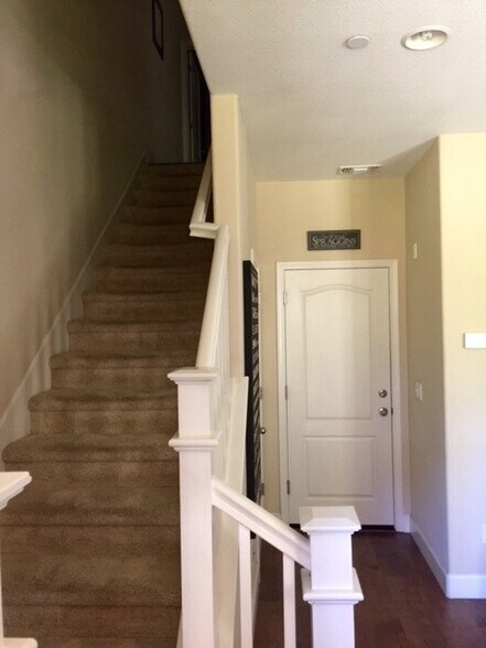 stairway up to the 2nd floor living space and kitchen - 722 El Paseo Cir