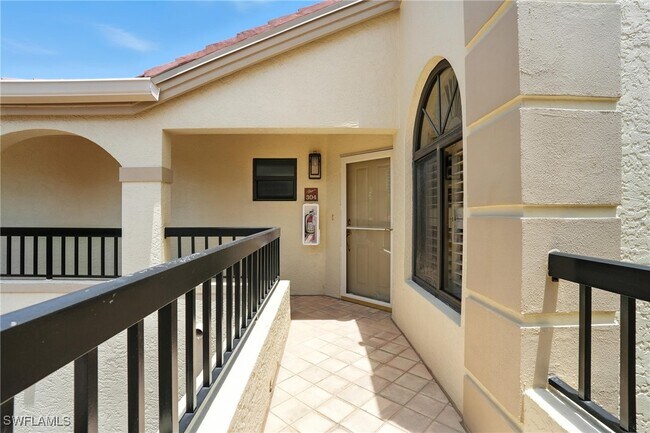Building Photo - 7032 Pelican Bay Blvd