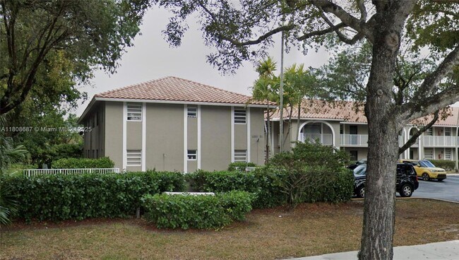 Building Photo - 11213 Royal Palm Blvd