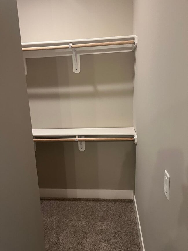 Building Photo - New Construction, 2 bed, 3 bath Row Home, with 2 car garage, fireplace, and rooftop deck!