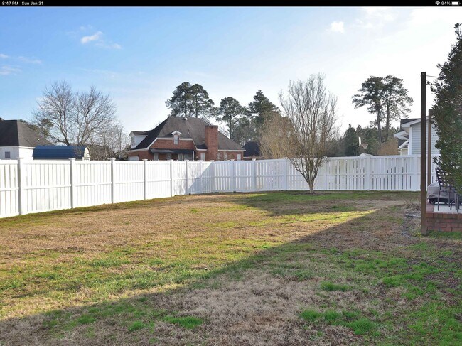 Fenced in backyard - 1001 Garden Gate Dr