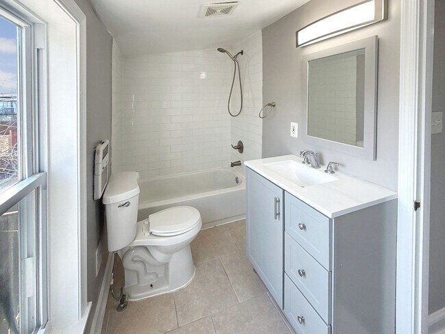 Building Photo - Charming Baltimore Rowhome with Private Backyard & Modern Updates