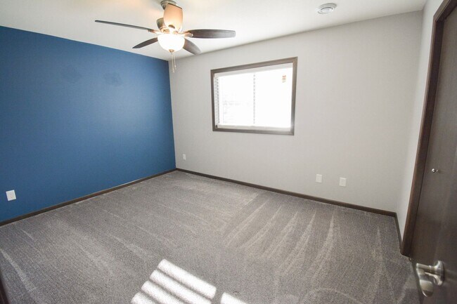 Building Photo - Remodeled 4-Bedroom Home for Rent with Garage & Deck