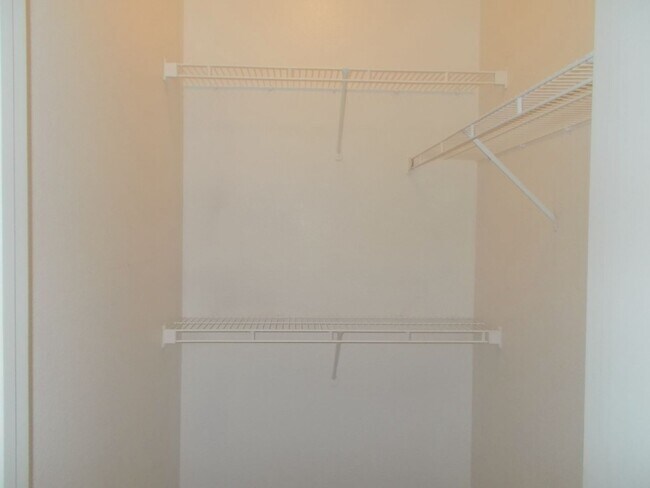 Building Photo - Bright Ground-Floor Condo in Gated Traverse Point with Pool & Spa Amenities