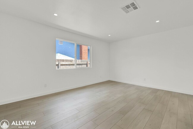 Building Photo - Fully Renovated 4-Bedroom Home with Firepl...