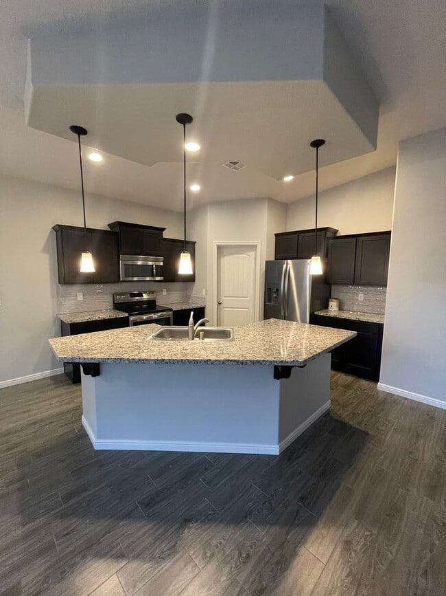 Building Photo - Home in Hayden Estates 3 bedroom, 2 bath with a 3 car garage