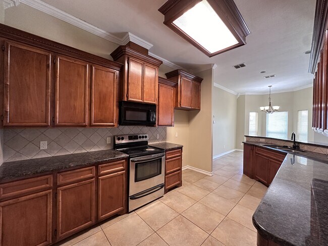 Building Photo - 5813 Aava Dr