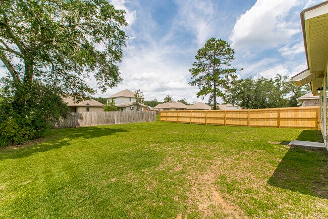 View from the left side of the house to the backyard - 48465 Red Fox Dr