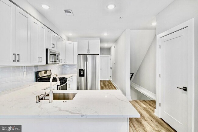 Building Photo - Brand New Luxury Apartments