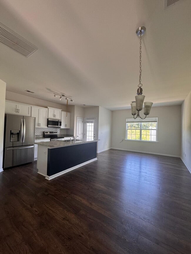 Building Photo - Modern 3-Bedroom Multiplex with 3 Full Bat...