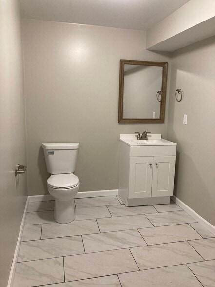 Basement half bathroom - 6504 Kelling St