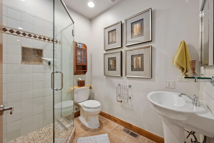 Art-Lined Glass Shower in Stylish Guest Bath - 1500 E Split Rock Dr