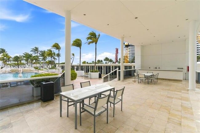 Building Photo - 10275 Collins Ave