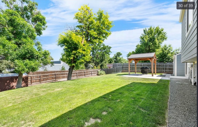 Building Photo - 6604 S Dahlia Cir