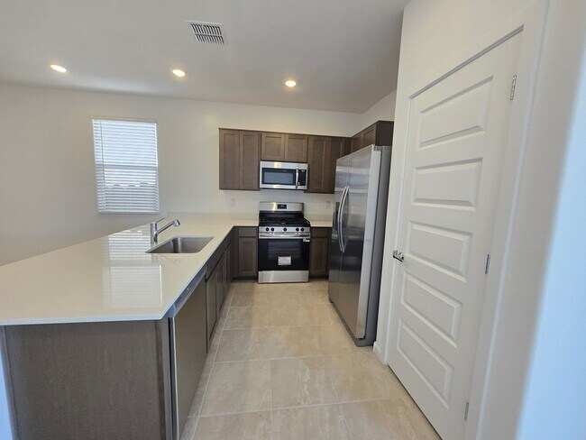 Building Photo - 3 Bedroom 2 Bathroom BELLA VISTA FARMS PREMIER Home