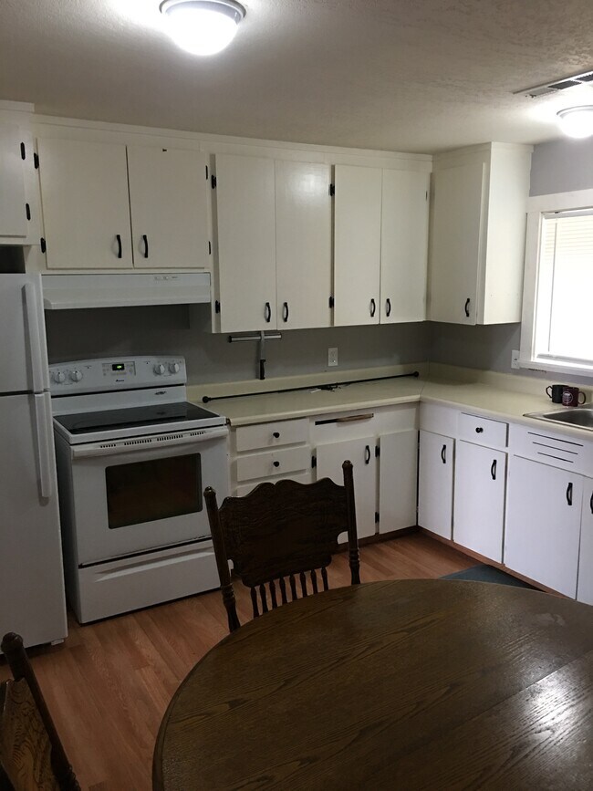 fullu stocked kitchen with loads of cupboard space - 2710 Oliver Ave