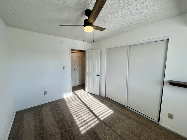 Building Photo - Charming 2 bedroom second story condo avai...