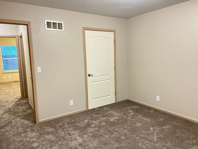 second upstairs bedroom - 1211 NW Ashley Ln